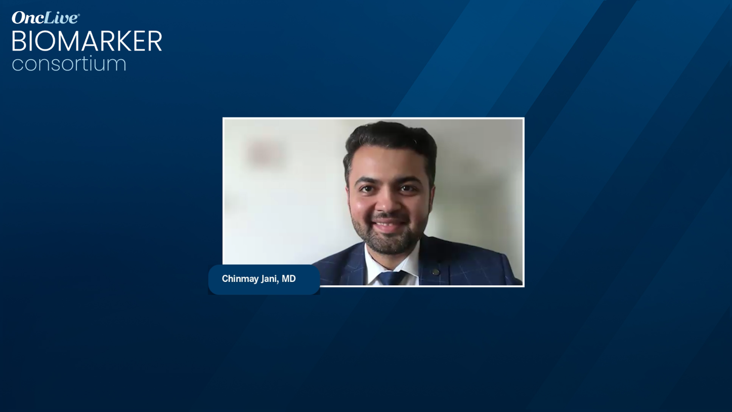 Two men are on a screen, one on the left and one on the right. Description generated by AI