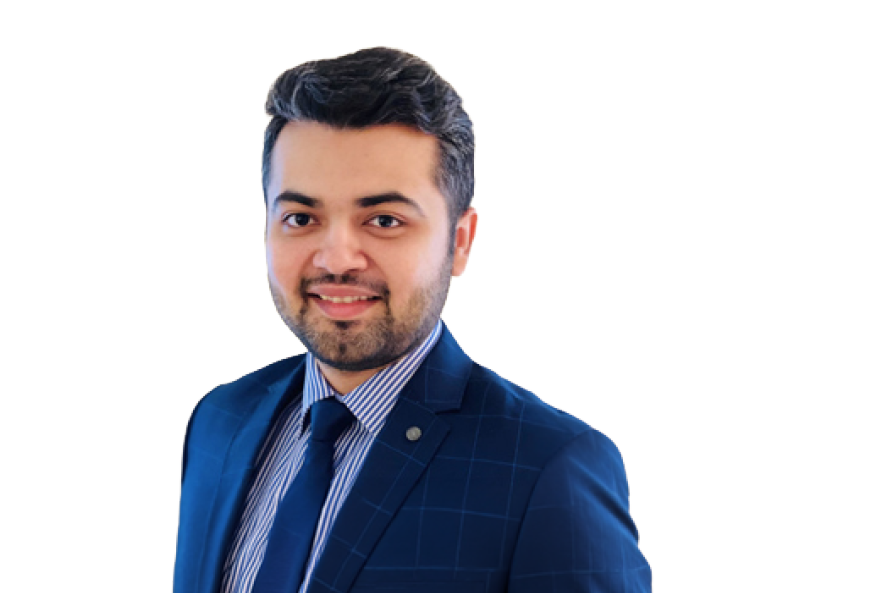 A man wearing a blue suit and a striped tie. Description generated by AI
